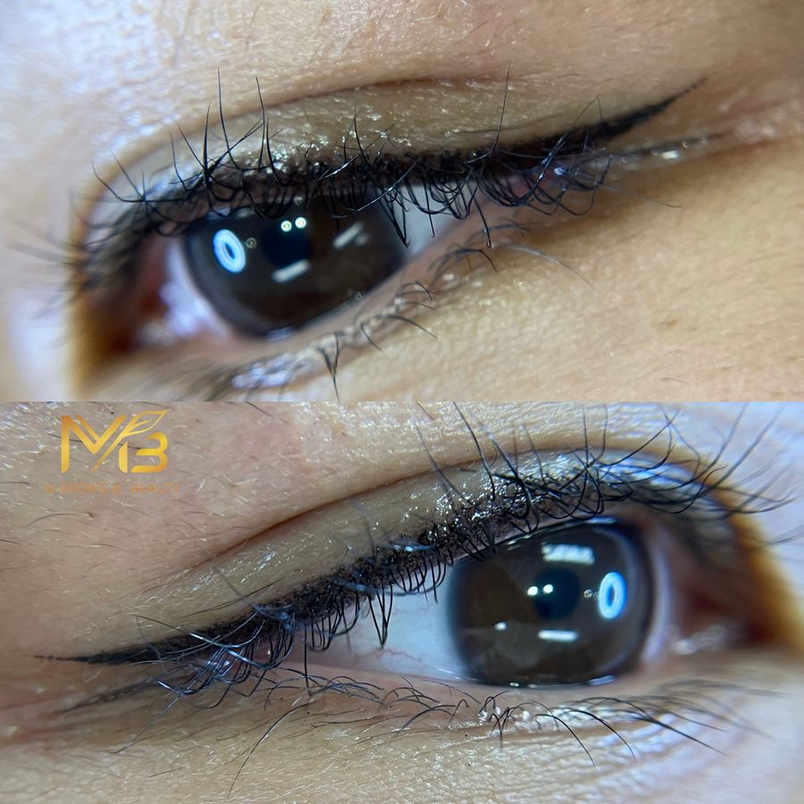 M Brows and Beauty Close-up of an eye before and after permanent make-up eyeliner. The top image shows a bare eyelid, whilst the bottom image displays a thin, precise black line. The "MB" logo appears in the bottom left of the lower image.